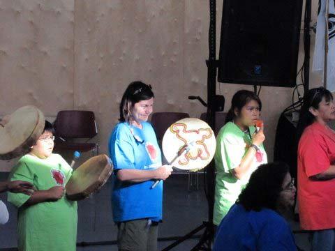 Michelle and her friends drumming
